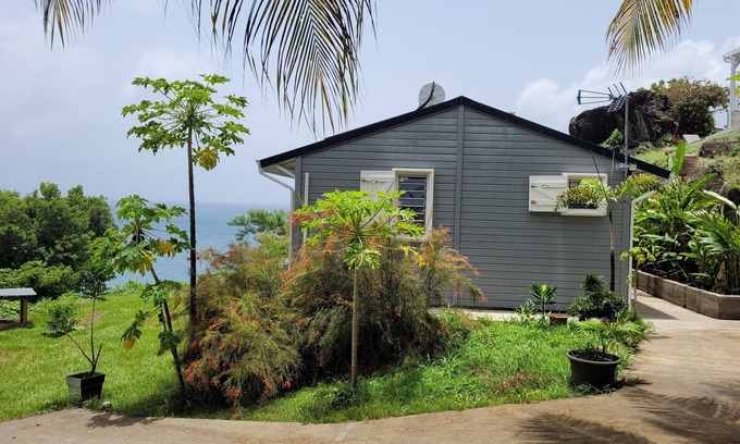 Malendure House | Lovely house and green setting, splendid view of the sea and islands of Les Saintes.