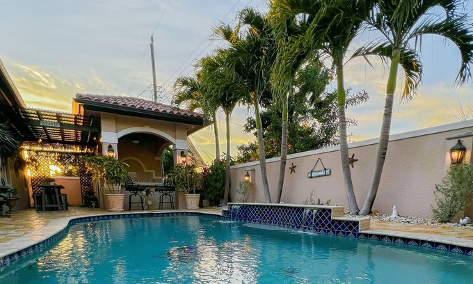 Olympia Heights House | Luxe Tuscany Property - Pool/BBQ/Hot Tub/Work Area/King Massage Bed