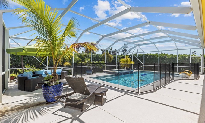 Fort Pierce House | Luxurious 4-Bedroom Pool Home -Walk to Beach & Restaurants