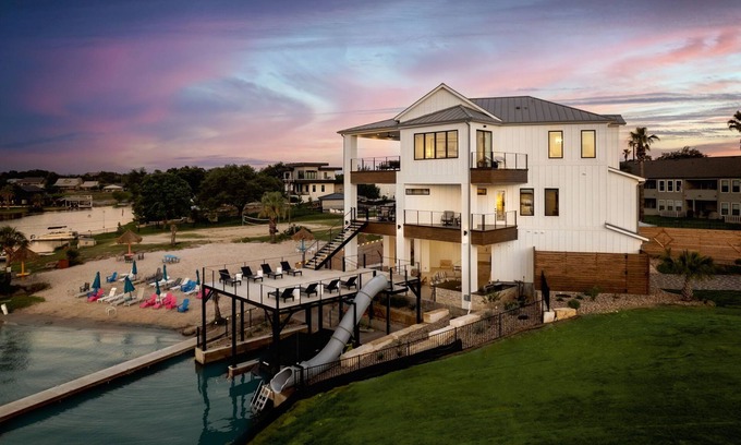 Granite Shoals House | Luxurious Lake Retreat: Sleeps 18, King Suites, Pool, Slide, Sun Deck, Elevator