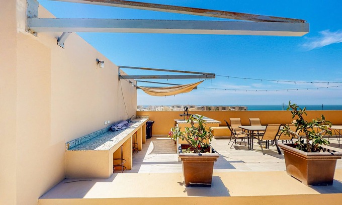 El Tezal Apartment | Luxurious mountain-view apartment close to the sea with rooftop sunset views