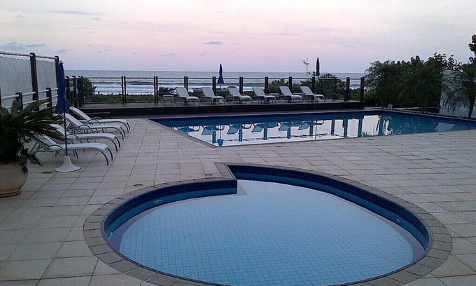 Santinho Apartment | Luxurious Sea Front Duplex with Resort structure in gated community.
