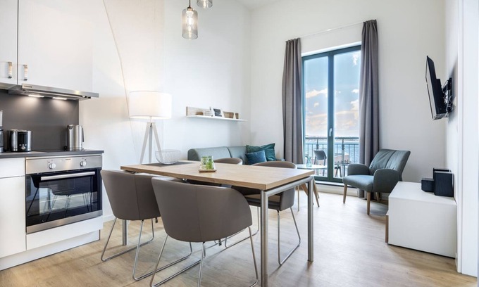 Wismar Apartment | Luxury apartment with gallery bedroom, roof terrace and unique harbor view!