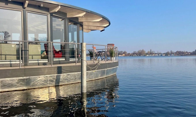 Werder Boat Rental | Luxury Floating Home Shanti 2 with fireplace & lakeside sauna