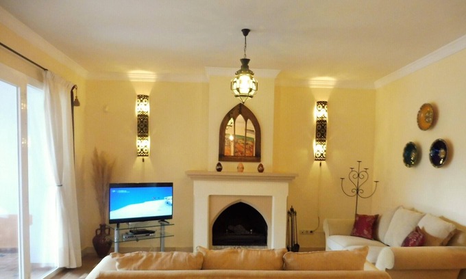 Bahia de Casares Apartment | luxury frontline beach ground floor apartment with seaviews, internet, 4 pools