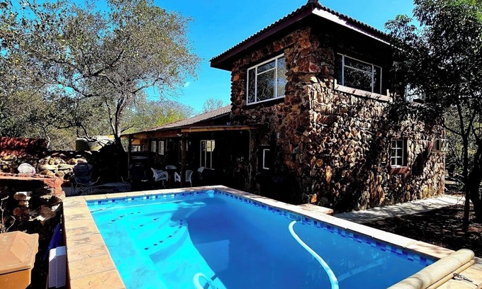 Marloth Park House | Luxury Guesthouse Co @ FlintstoneHousen5bedroom house in phenomenal Marloth Park