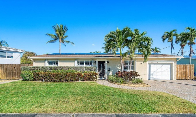 Lake Worth House | Luxury Lakefront Retreat with Heated Pool, Tiki Lounge, Dock, Gym & EV Charger