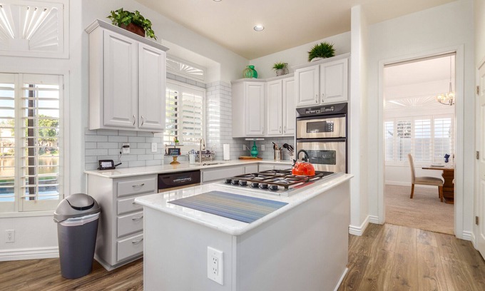 Val Vista Lakes House | Luxury Waterfront Home w/GAME ROOM & HEATED POOL