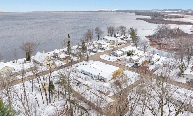 Shawano House | Mader Haven Across from the Lake by RedAwning