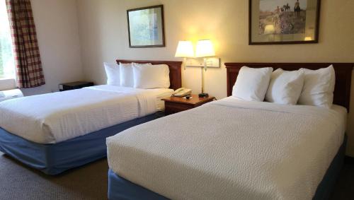 Malone Hotel | Magnuson Hotel West Liberty