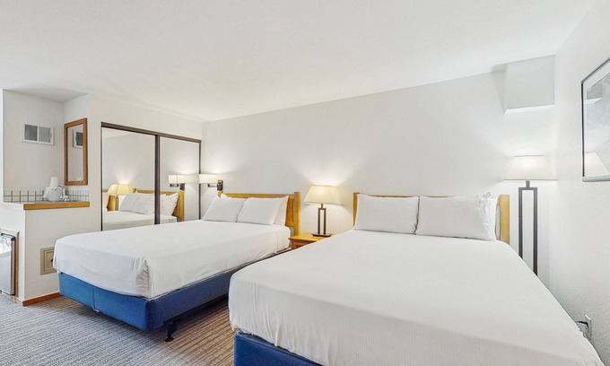 West End Apartment | Main Street room - hot tub & pool - walk to lifts, dog-friendly, balcony