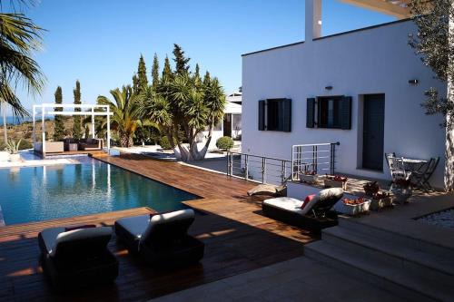 Kontos House | Maisonnette Koukounaries piscine et vue mer