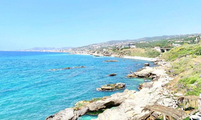 Kfardebian House | Majestic Palm: Beachfront Exotic Room in Batroun