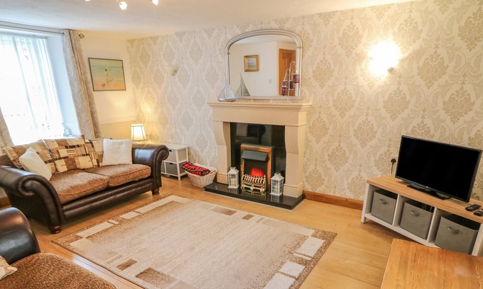 Carnlough Cottage | MCCOLLUMS CORNER, family friendly, with open fire in Carnlough