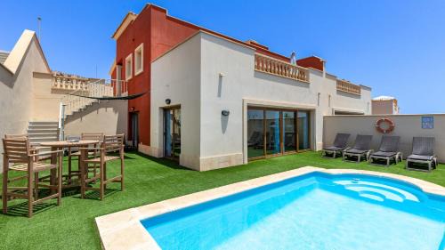 Caleta de Fuste House | Men Men