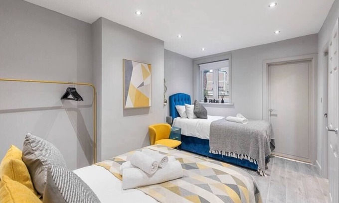 Harrow Apartment | Metropolitan Living: Sleek 3BR with Vibrant Flair