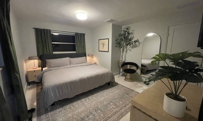 East Naples House | Midcentury Rambler with large backyard and open patio.