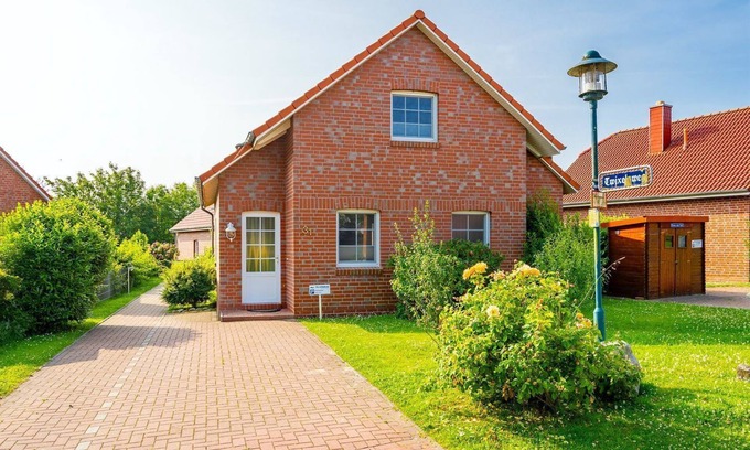 Eilsum House | Midsummer - Beautiful vacation home (100sqm) for 6 people with fireplace, garden and