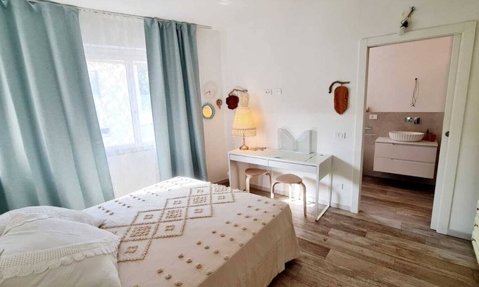 Porto San Giorgio Apartment | Minimal boho beach apartment, Catia Apartment n25 with umbrella and 2 deck chairs