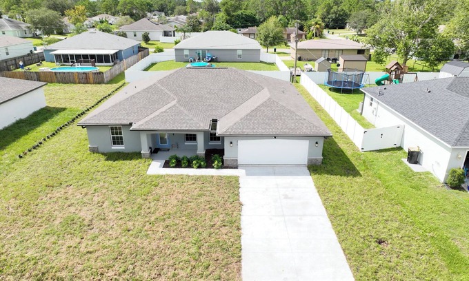 Port Malabar House | "Modern 4BR, 2BA home: brand new, spacious & family-friendly in prime location!"