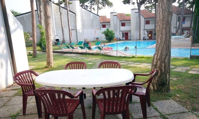 Lignano Sabbiadoro Apartment | Modern and fully equipped four room apartment with pool