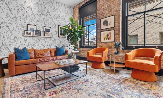 Central Business District Hotel | Modern Comfort Downtown– Pool, Gym, Game Room, Luggage Lockers & More