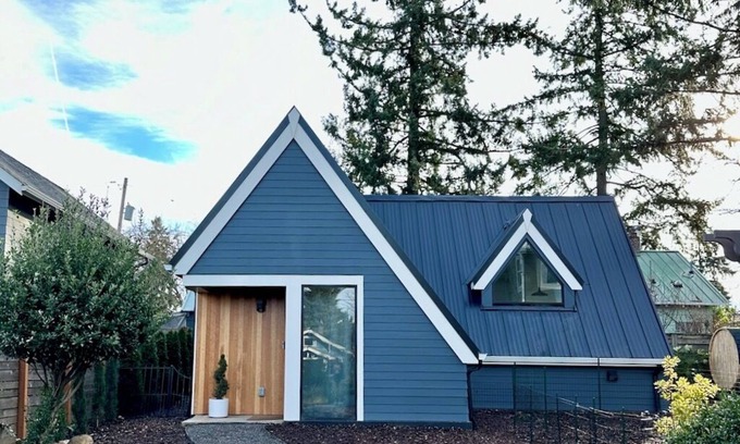 Cully House | Modern Home with Cedar Sauna & Outdoor Patio
