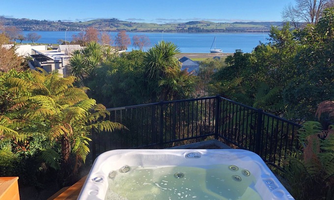 Two Mile Bay House | Modern, Stunning Lake Views & Hot Tub - Cross the street to the Lake!