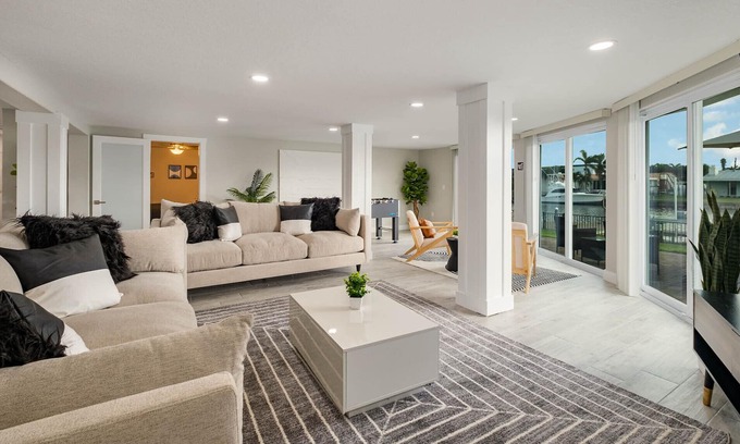 Cocoa Isles House | *Modern Waterfront Home* Sleeps 8-LARGE KITCHEN/LIVING Area-1 minute to beach