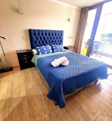 Apoquindo Apartment | Moderno Departamento I Piscina Temperada I Calefacción I GYM I Lavandería I Piscina en Azotea I Estacionamiento I Las Condes