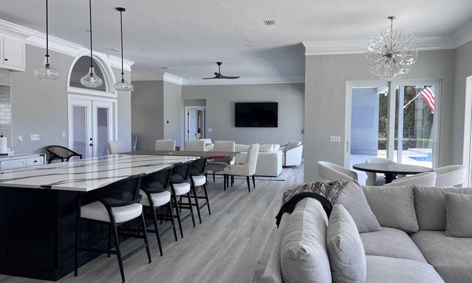 Palm River Estates House | Near NCH Baker, NSS Luxury Retreat Near Beach Featuring Pool GameRoom