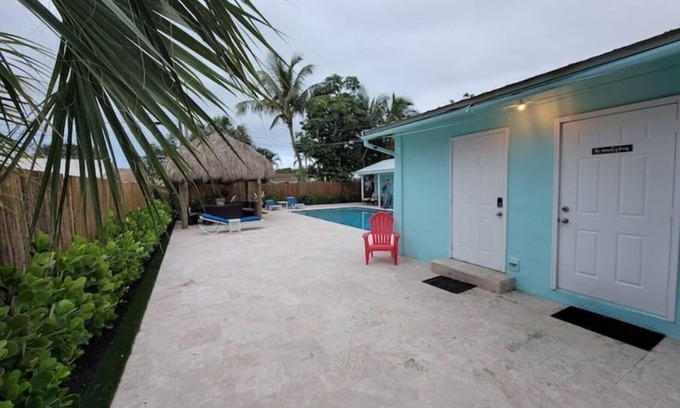Tequesta Apartment | New Bedroom, Kitchen and Bathroom with a Pool