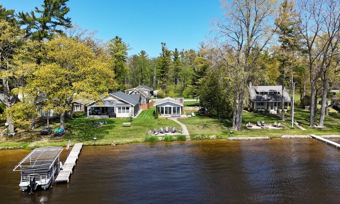 Oscoda Cottage | New! Loon Lodge - Super Cute, Lakefront, Bonfire Ring, and Private Dock!
