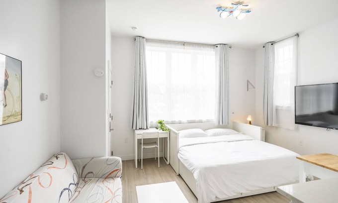 Queens Apartment | NEW! Luxury Studio! Smart Home! Main St! w/Free Parking!