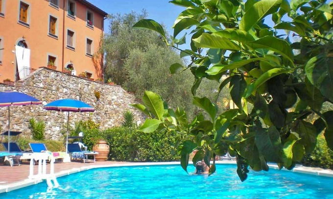 Massarosa House | Nice apartment in villa with pool, internet, TV, terrace, pets allowed, parking, close to Viareggio