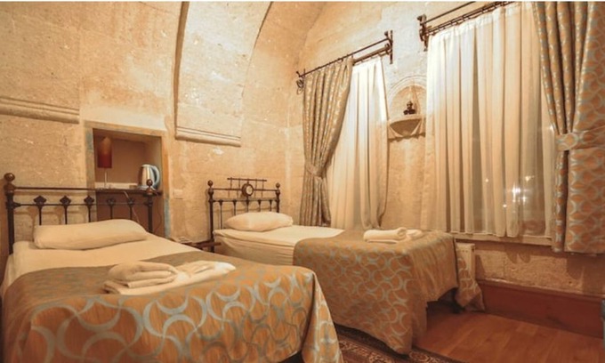 Goreme House | Nomads - Traditional Arch Stone room at the center