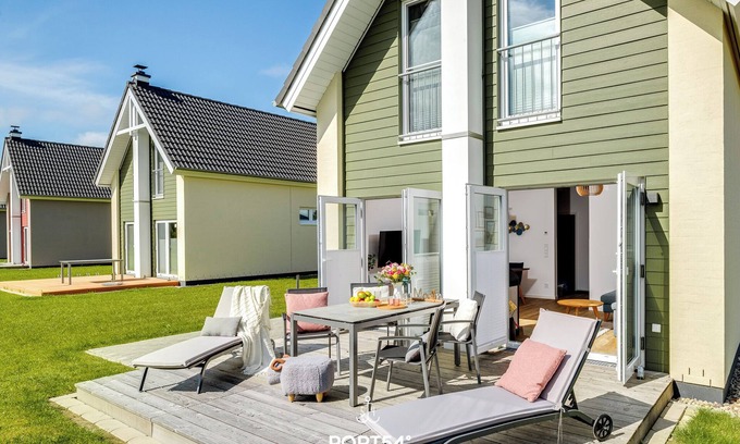 Busum House | Nordic Lodge Büsum - terrace, fireplace, close to the beach and the North Sea