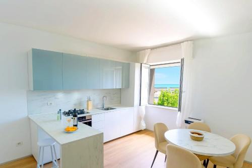 Casabianca di Fermo Apartment | OFFER AGOSTO - Sulla Spiaggia Parking - AC & WiFi