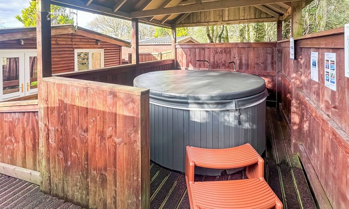 Ystradgynlais Ski Chalet | Open plan lodge with two doubles, both with TV/DVD.