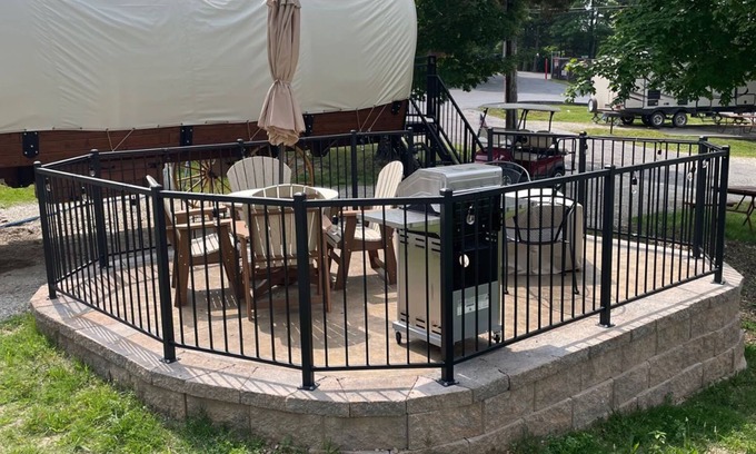 Branson Cottage | Oregon Trail Wagon has two queens size bed, bathroom w/shower, heat & a/c, smart tv, wi-fi, microwa