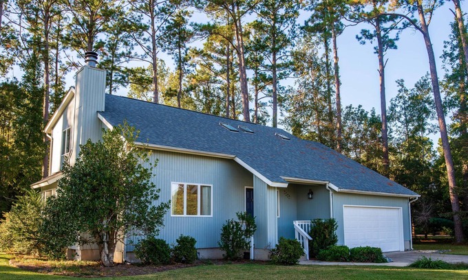 Oriental House | Oriental Oasis is a Contemporary single family home with a large fenced in yard