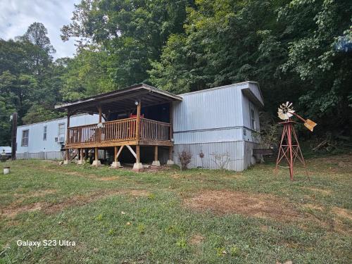 South Point House | Over the hill and through the woods