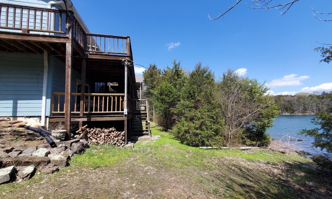 Garfield House | Owls Nest-Lakefront-Private Wooded Setting Sleeps 16