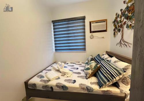 Puerto Princesa City Centre Apartment | Palawan Family Getaway 2BR Condo with a Balcony, FREE Pool, Gym, Parking - B2 5Moonstone