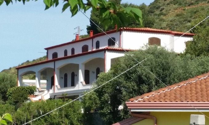 Fuscaldo Apartment | Panoramic apartment in villa 300 meters from the sea, private garden with sea view