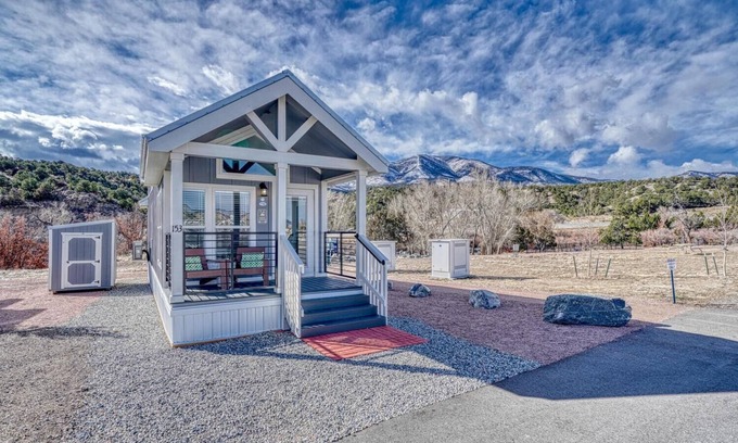 Salida Cabin | Park Model Cabin - Twin Loft - One queen bed in the private bedroom, with two twin beds in the open loft.