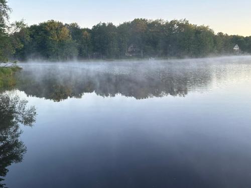Pocono Lake House | Peaceful Pocono Lakefront, beach, pools, firepit, pets