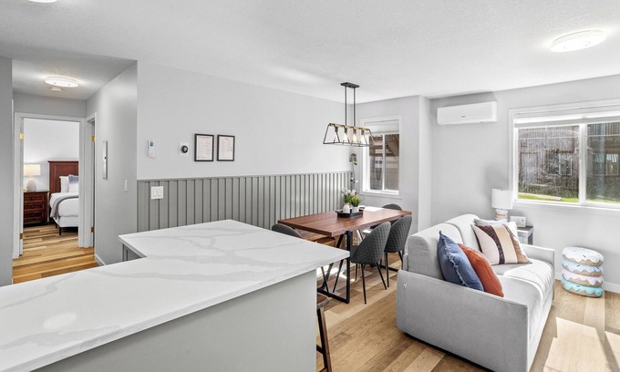 Harvie Heights House | Peaks & Comfort- hot tub, free parking, King bed, AC, 2BR, sleeps 8