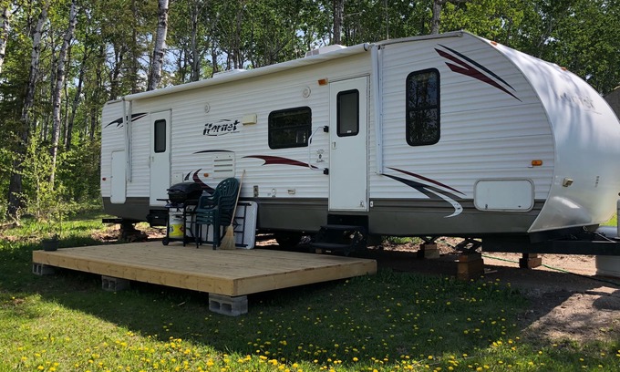 Onanole House | Pelican - Camper at Sunset Bay