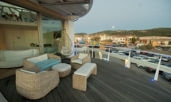 Trinita d'Agultu e Vignola House | penthouse with sea view in a luxury beachfront villa in IsolaRossa
